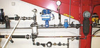 Steam to MTHW providing 110 Deg.C hot water for a batch cooking process.
The steam to water, water to product, process allows close temperature control of the of the product during the initial heating and simmering. Ensuring a quality cooked product.   